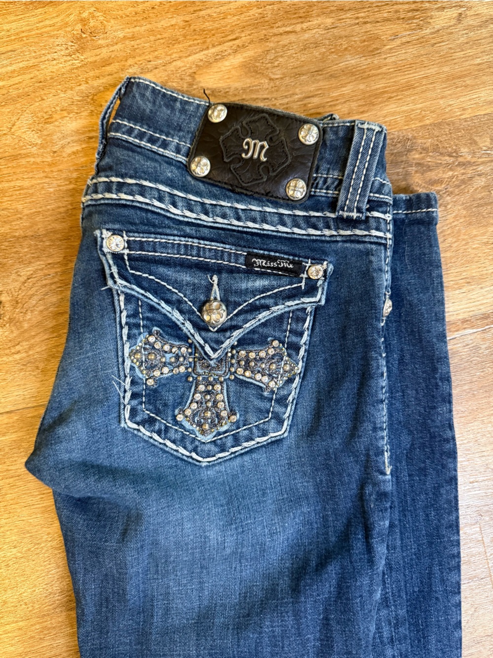 Miss Me Dark Blue Rhinestone Cross Boot Cut Jeans
